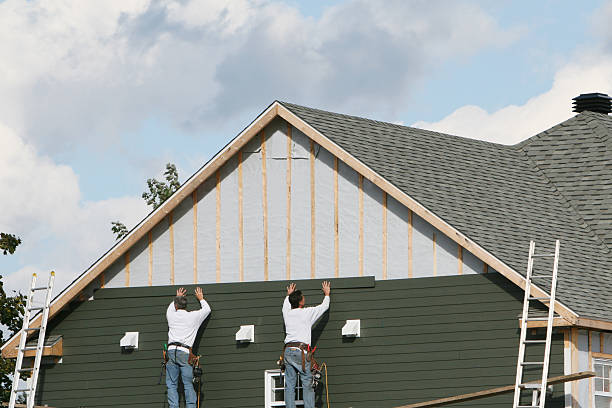 Professional Siding Installation technician working in Freeland, PA